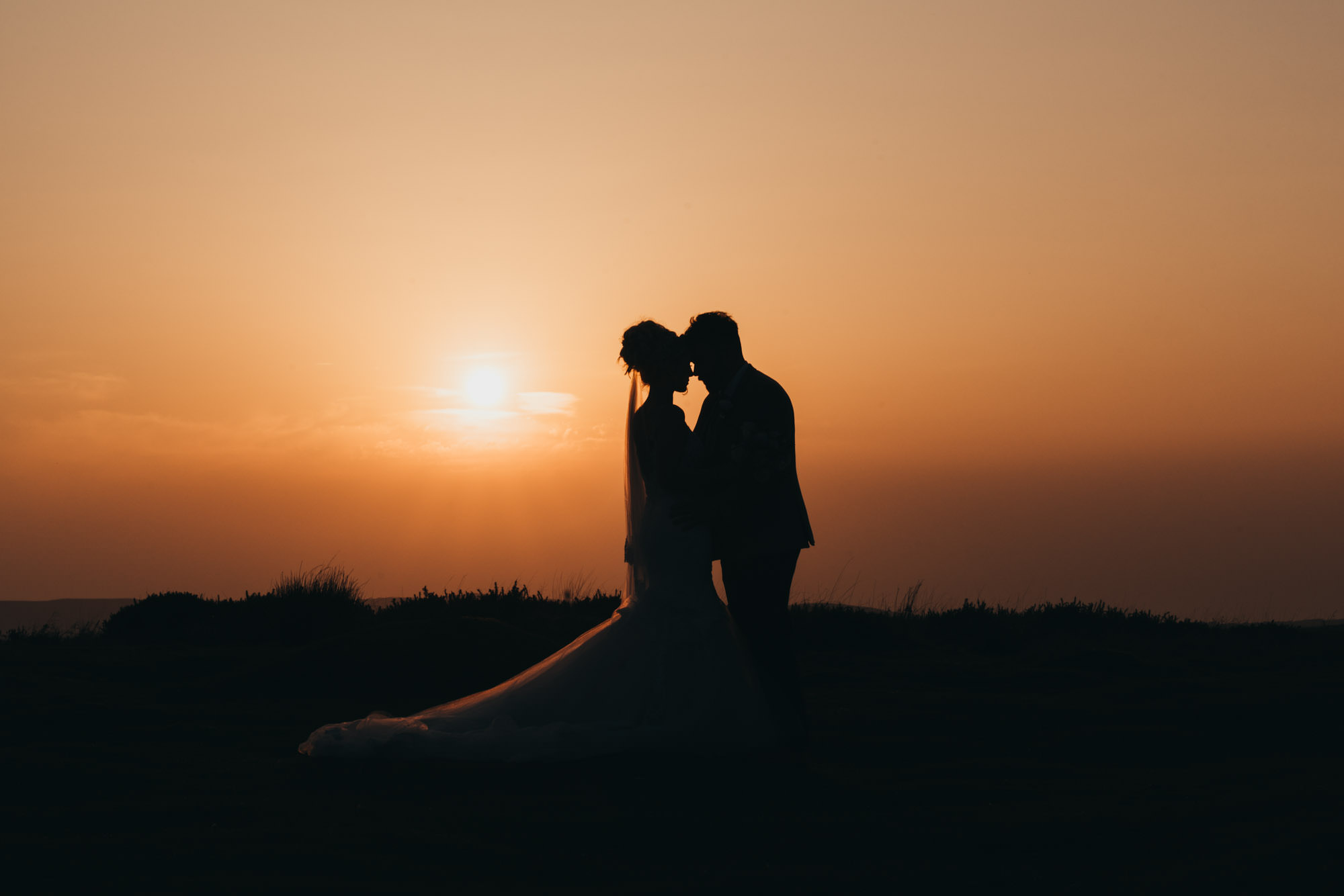 Swansea wedding photography silhouette at sunset